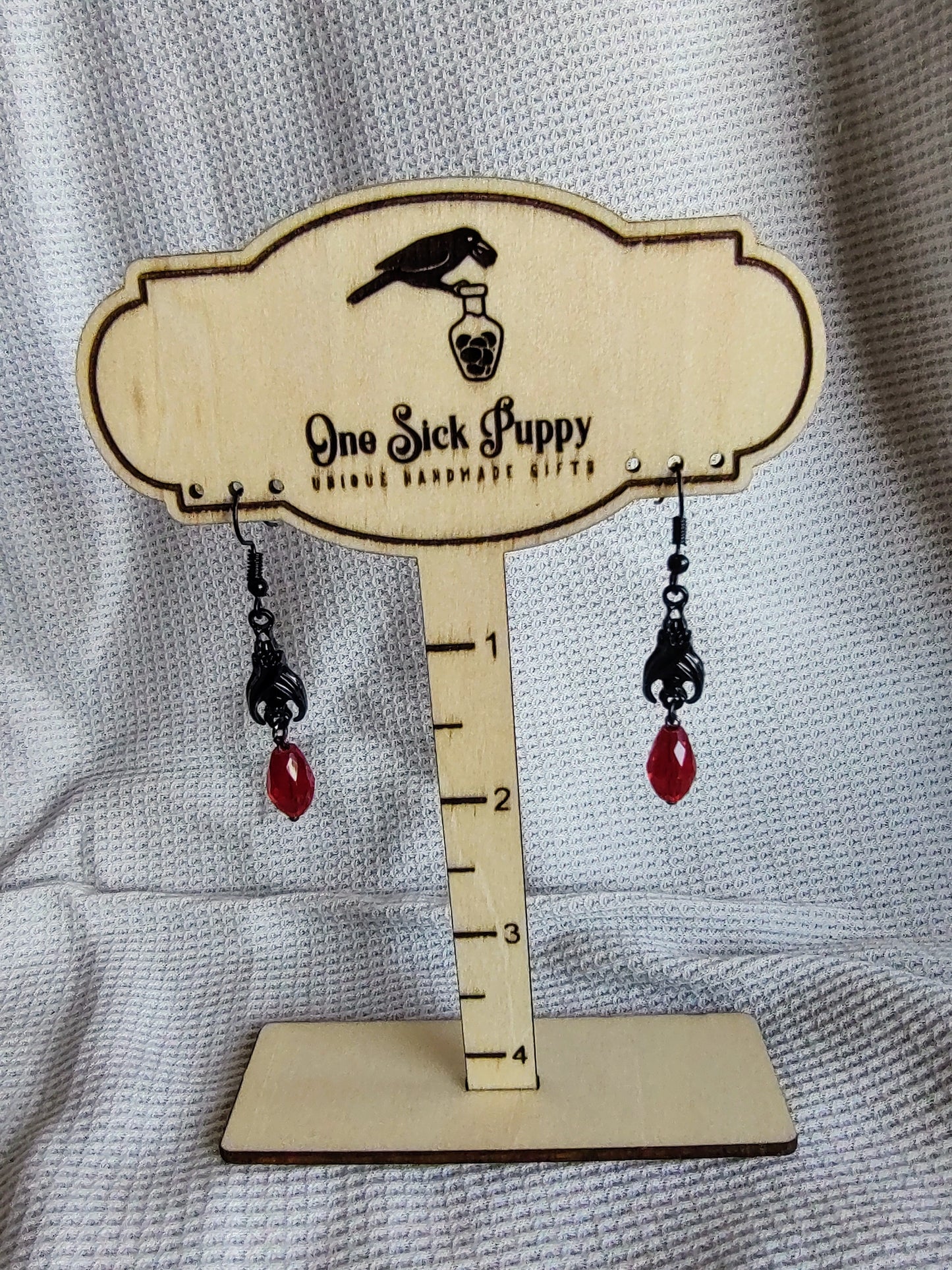 Metal and Crystal Bat Drop Earrings