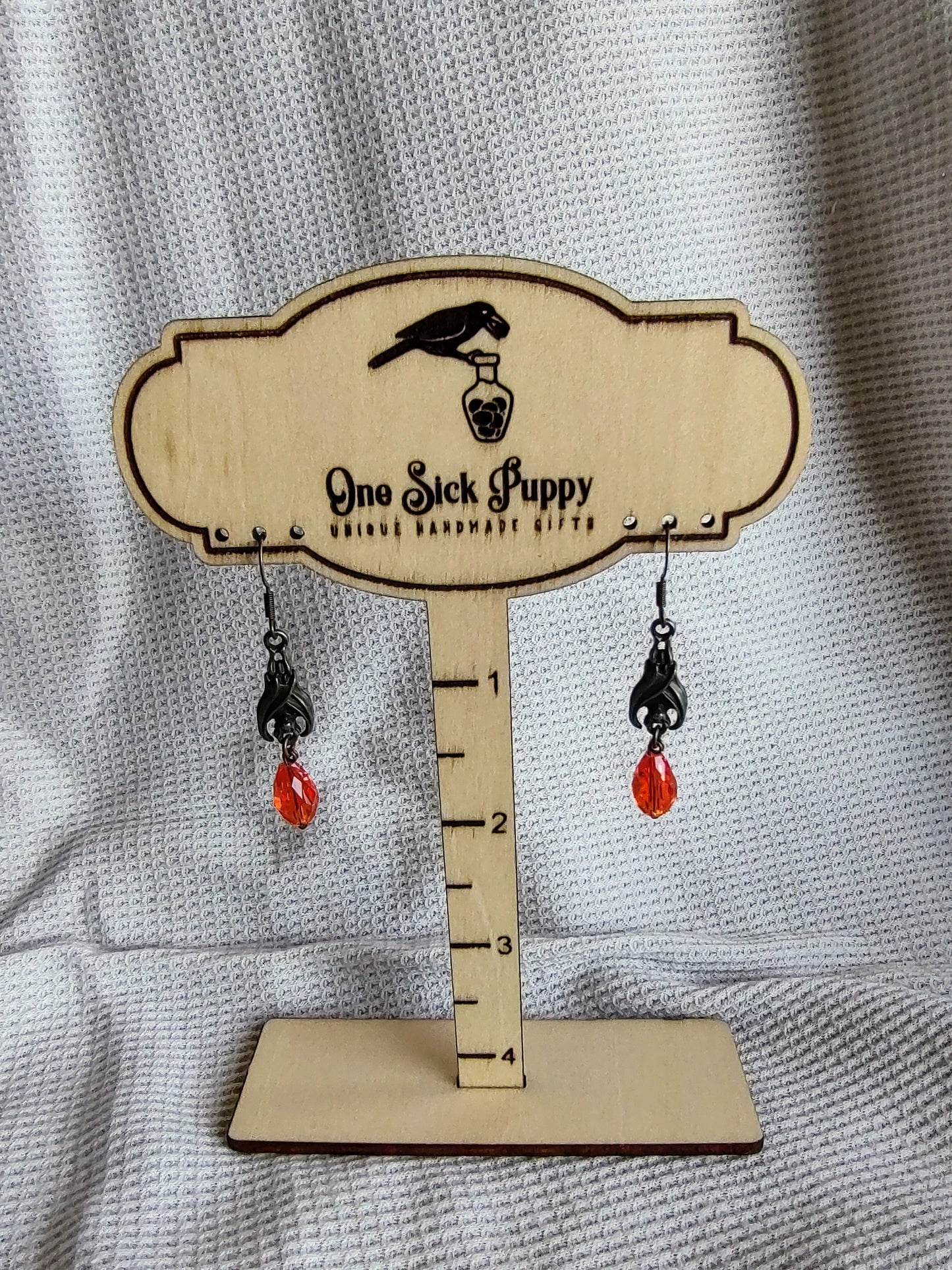 Metal and Crystal Bat Drop Earrings