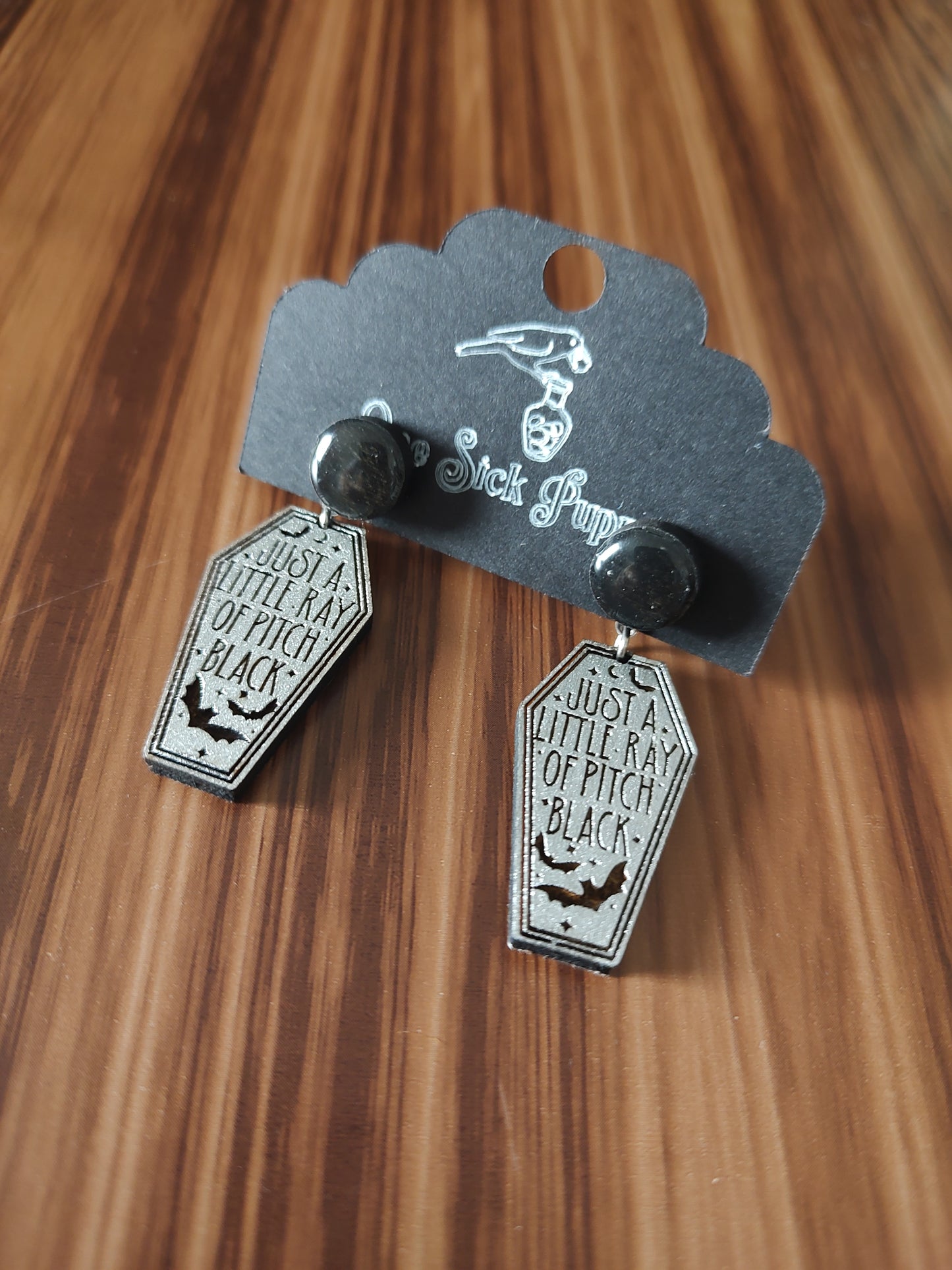 Ray Of Pitch Black Dangle Earrings